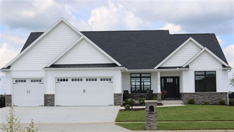 white exterior house with black roof